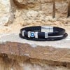 Δερμάτινο ανδρικό βραχιόλι με μάτι από σμάλτο και μαγνητικό κούμπωμα Δερμάτινο ανδρικό βραχιόλι με επάργυρα μεταλλικά στοιχεία και μαγνητικό κούμπωμα