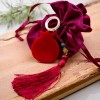 Γούρι ρόδι σε βελούδινο πουγκί CHRISTMAS FREE GIFT