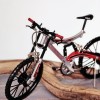 Easter candle for boys with key-chain and metallic mountain bike with realistic details