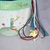 Set of Easter candle and chocolate egg Little Prince in a fabric pocket