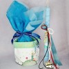 Set of Easter candle and chocolate egg Little Prince in a fabric pocket