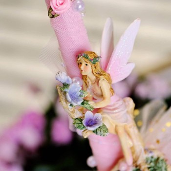 Easter candle with ceramic fairy