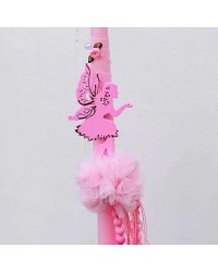 Easter candle with wooden fairy and romantic ribbons Easter candle with wooden fairy and romantic ribbons