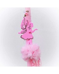 Easter candle with wooden fairy and romantic ribbons Easter candle with wooden fairy and romantic ribbons