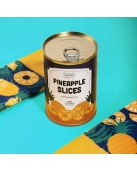 Women's socks with pineapple patterns in a tin can Women's socks with pineapple patterns in a tin can