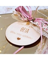 Wooden good luck charm with message for aunt and romantic ribbons Wooden good luck charm with message for aunt in a gift box and romantic ribbons