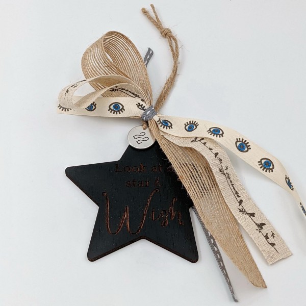 Wooden good luck charm 2022 with star and ribbons