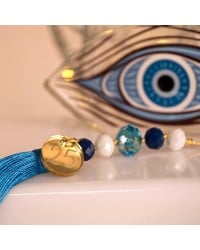 Lucky charm with resin evil eye, crystals and tassel Lucky charm 2025 with resin evil eye, crystals and tassel