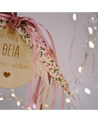 Wooden good luck charm with message for aunt and romantic ribbons Wooden good luck charm with message for aunt in a gift box and romantic ribbons