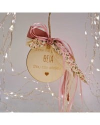 Wooden good luck charm with message for aunt and romantic ribbons Wooden good luck charm with message for aunt in a gift box and romantic ribbons