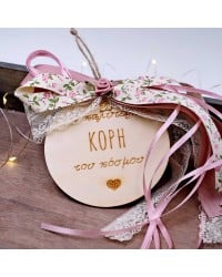 Wooden good luck charm with message for daughter and romantic ribbons Wooden good luck charm with message for daughter in a gift box and romantic ribbons