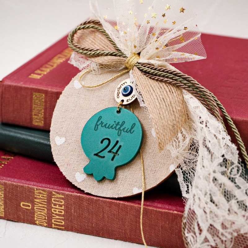 Handmade lucky charm 2025 with wooden part and Pomegranate made of plexiglass Handmade lucky charm 2025 with wooden part and Pomegranate made of plexiglass