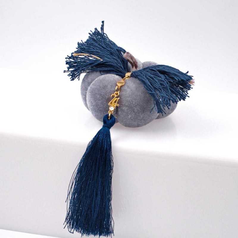 Handmade good luck charm pumpkin with gold-plated parts and tassels Handmade good luck charm pumpkin with gold-plated parts and tassels