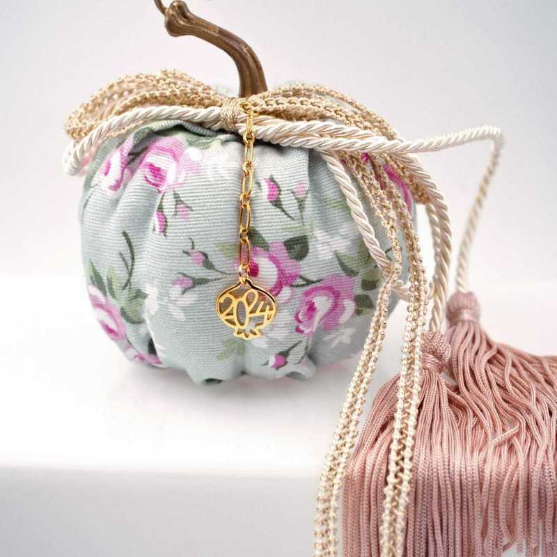 Handmade good luck charm pumpkin with gold-plated parts and tassels Handmade good luck charm pumpkin with gold-plated parts and tassels