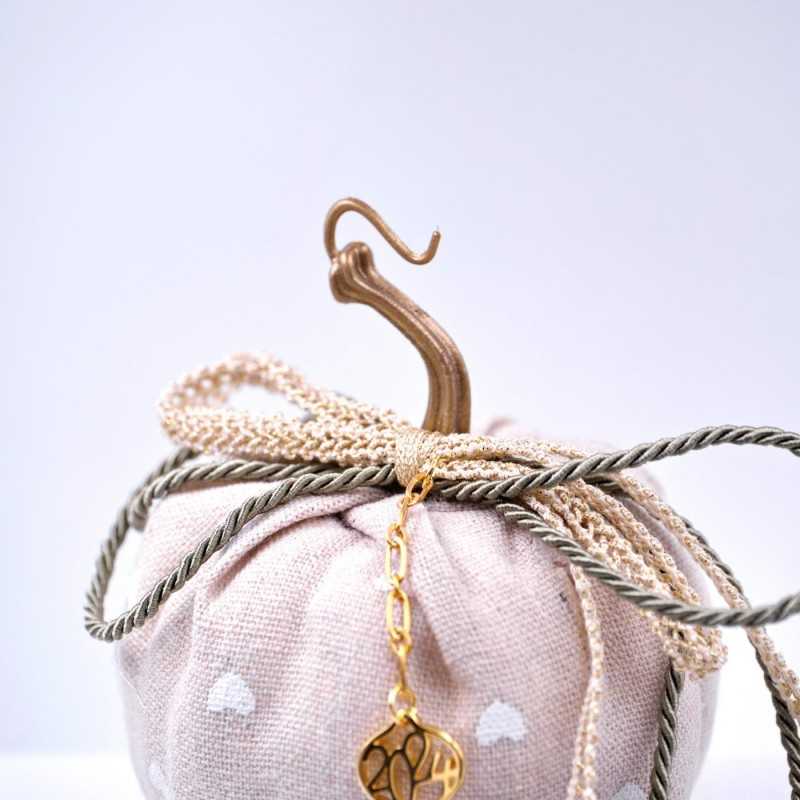 Handmade good luck charm pumpkin with gold-plated parts and tassels Handmade good luck charm pumpkin with gold-plated parts and tassels