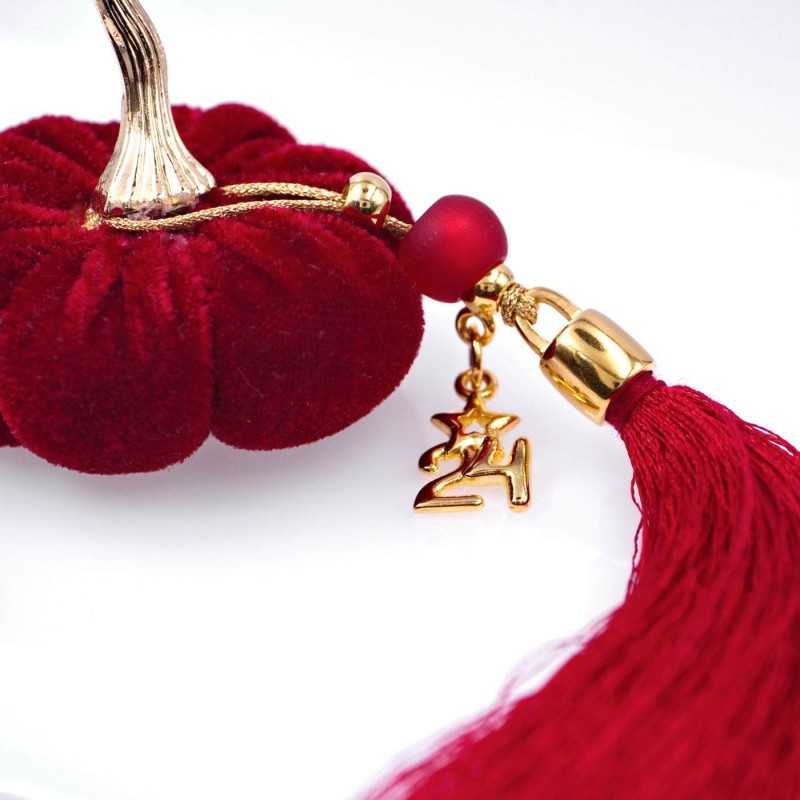 Handmade good luck charm pumpkin with gold-plated parts and tassel Handmade good luck charm pumpkin with gold-plated parts and tassel