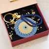 Handmade lucky keyring Evil Eye with meander pattern in a gift box