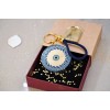 Handmade lucky keyring Evil Eye with meander pattern in a gift box
