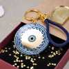 Handmade lucky keyring Evil Eye with meander pattern in a gift box