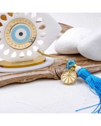 Χειροποίητο καλοκαιρινό γούρι μάτι πλέξιγκλας Χειροποίητο καλοκαιρινό γούρι μάτι από πλέξιγκλας με μεταξωτή φούντα