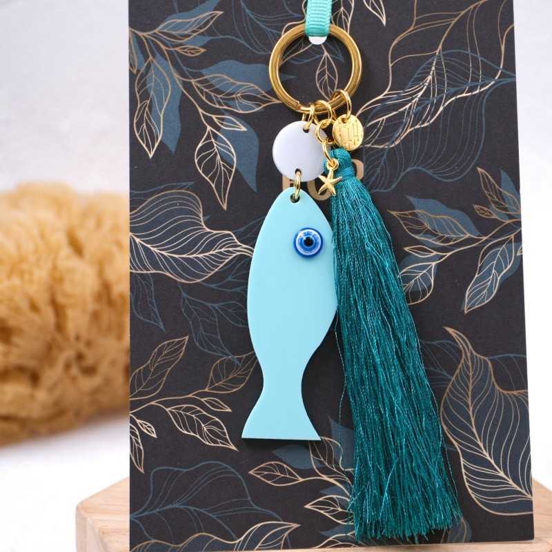 Handmade key-chain with plexiglass little fish Handmade key-chain with plexiglass little fish, acrylic evil eye and silk tassel