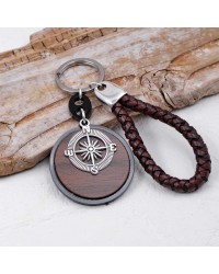 Ανδρικό Μπρελόκ Compass Χειροποίητο ανδρικό μπρελόκ από πλεκτό δέρμα, πλέξιγκλας και επάργυρα στοιχεία