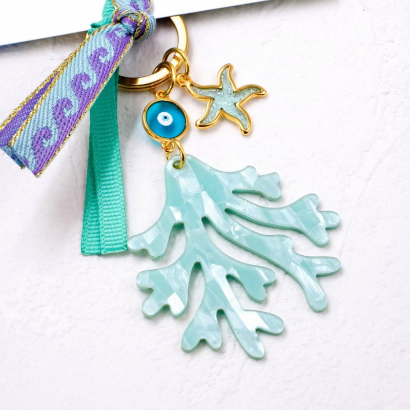 Handmade key-chain with plexiglass sea coral and evil eye Handmade key-chain with plexiglass sea coral and evil eye