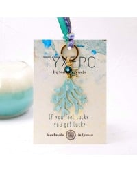 Handmade key-chain with plexiglass sea coral and evil eye Handmade key-chain with plexiglass sea coral and evil eye