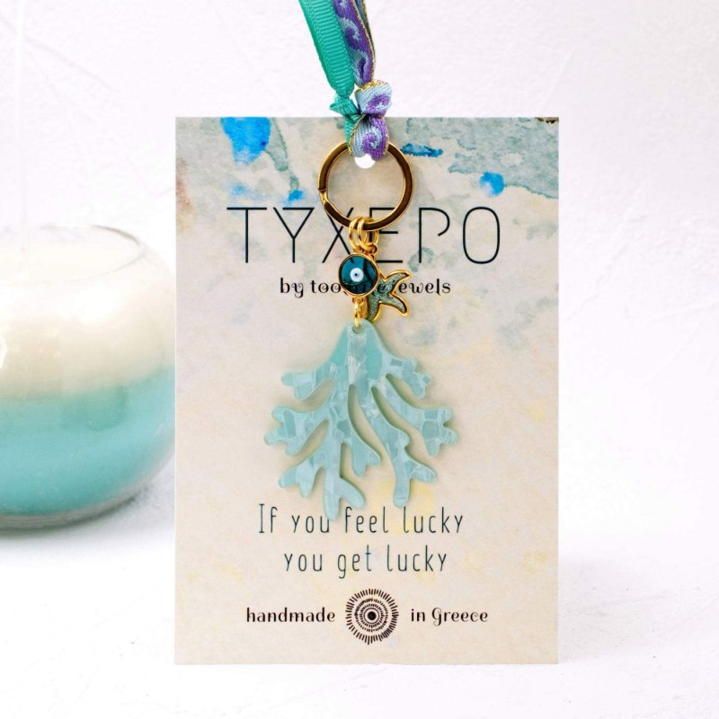 Handmade key-chain with plexiglass sea coral and evil eye Handmade key-chain with plexiglass sea coral and evil eye