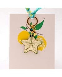Handmade key-chain with plexiglass starfish and evil eye Handmade key-chain with plexiglass sea shell and evil eye drop