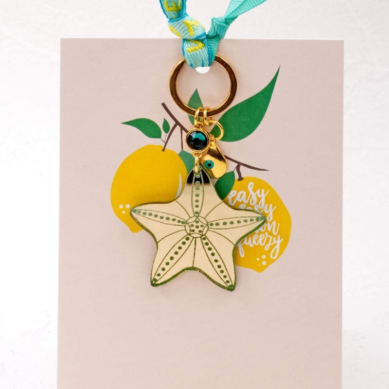 Handmade key-chain with plexiglass starfish and evil eye Handmade key-chain with plexiglass sea shell and evil eye drop