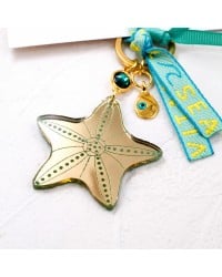 Handmade key-chain with plexiglass starfish and evil eye Handmade key-chain with plexiglass sea shell and evil eye drop