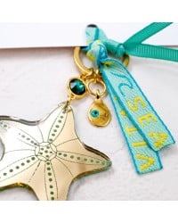 Handmade key-chain with plexiglass starfish and evil eye Handmade key-chain with plexiglass sea shell and evil eye drop