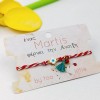 Martis bracelet with enamel cross and a decorative card with message