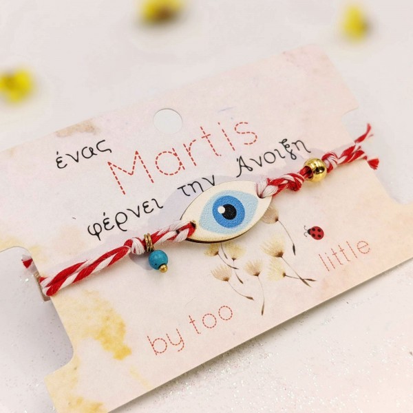 Martis bracelet with evil eye and a decorative card with message