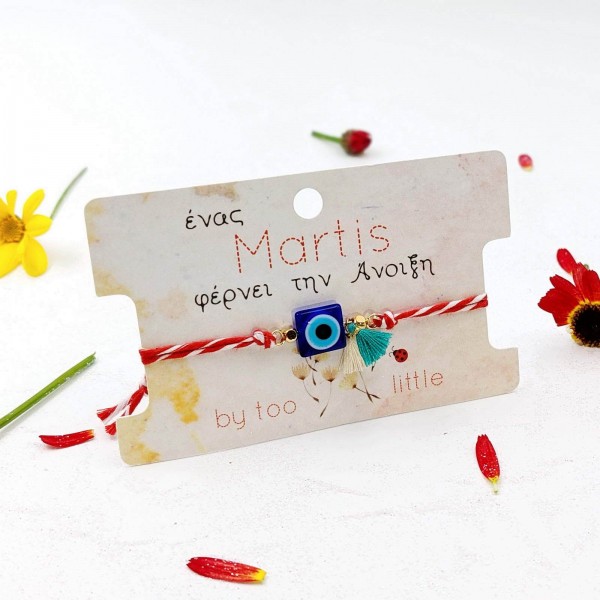 Martis bracelet with evil eye and a decorative card with message