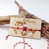 Martis bracelet with resin poppy and a decorative card with message