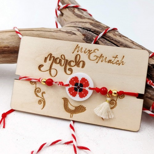 Martis bracelet with resin poppy and a decorative card with message