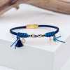 Leather bracelet with enamel, vitraux glass and metal parts in gold-plating