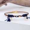 Leather bracelet with enamel, vitraux glass and metal parts in gold-plating