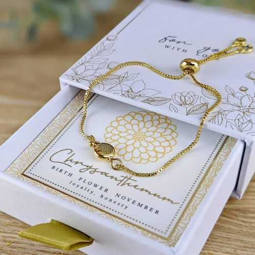 Βραχιόλι αλυσίδα με λουλούδι γέννησης Βραχιόλι αλυσίδα με λουλούδι γέννησης σε επίχρυση επιμετάλλωση