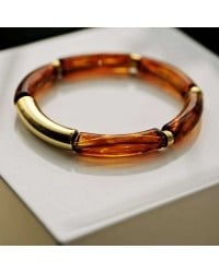 Handmade elastic bracelet with resin and gold-plated metal parts Handmade elastic bracelet with resin and gold-plated metal parts