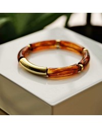Handmade elastic bracelet with resin and gold-plated metal parts Handmade elastic bracelet with resin and gold-plated metal parts