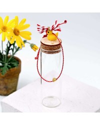 Martaki bracelet with gold-plated parts and decorative bottle Martaki bracelet with gold-plated parts and decorative bottle