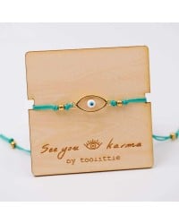 Handmade macrame bracelet with gold-plated enamel eye and wooden card Handmade macrame bracelet with gold-plated enamel eye and wooden card