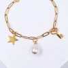 Handmade chain bracelet made of stainless steel with 24K gold-plating and fresh water pearls