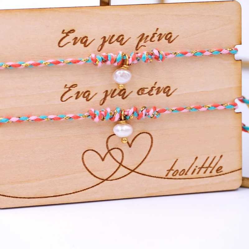 Bracelets with fresh water pearls for mother and daughter on decorative card 