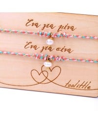 Bracelets with fresh water pearls for mother and daughter on decorative card Bracelets with fresh water pearls for mother and daughter on decorative card