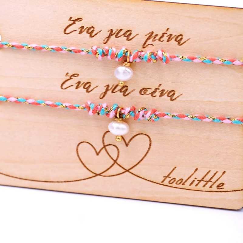 Bracelets with fresh water pearls for mother and daughter on decorative card 