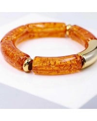Handmade elastic bracelet with resin and gold-plated metal parts Handmade elastic bracelet with resin and gold-plated metal parts